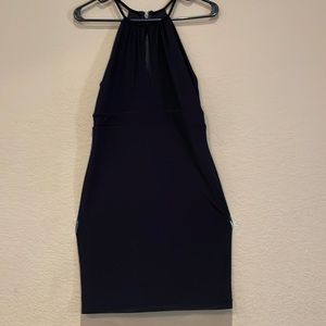 This is a black guess halter top dress and it is a medium in Womens.